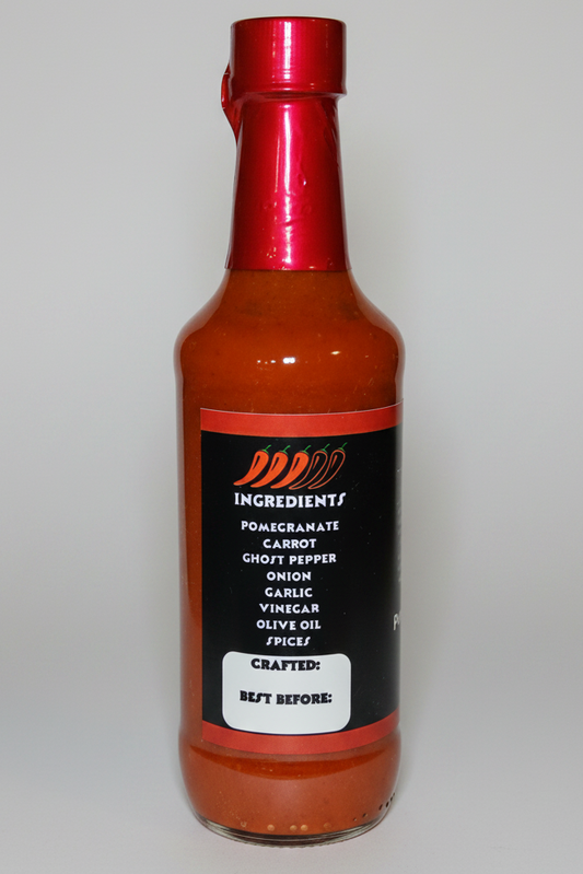 A bottle of hot sauce with a metallic red cap and a black label featuring red and white text, set against a plain white background.