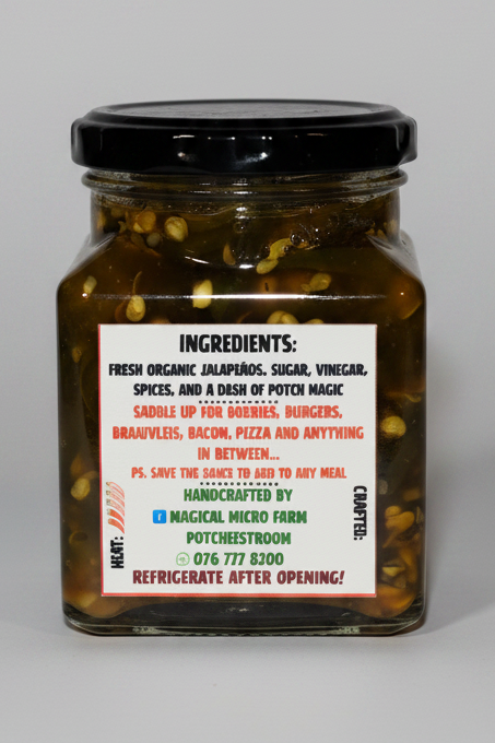A glass jar of 'Potnerystroom' hot sauce with a black lid and a white label, set against a plain white background.